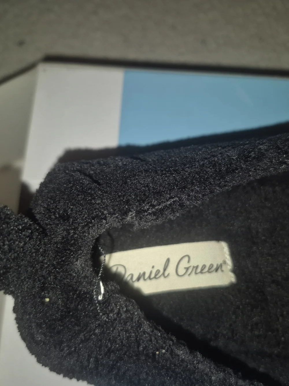 Daniel Green Women's Black Slip-On Slipper with Leopard Accent